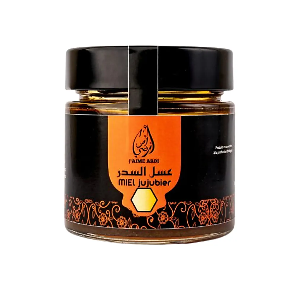 Miel de jujubier 250g J’aime Ardi Pot de miel de jujubier 250g avec étiquette J’aime Ardi posé sur fond blanc